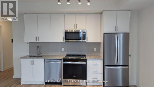 1108 - 345 Wheat Boom Drive, Oakville, ON - Indoor Photo Showing Kitchen