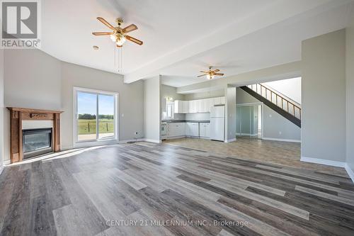 395115 County Road 12 Road, Amaranth, ON - Indoor Photo Showing Living Room With Fireplace
