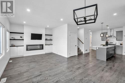 Upgrade ceiling lights - 133 Marconi Court, London East, ON - Indoor With Fireplace