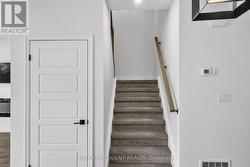 Stairs leading to second floor - 