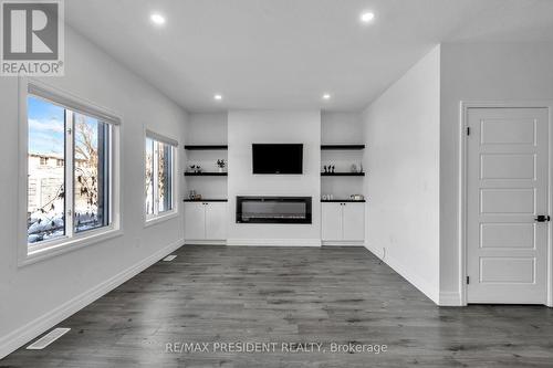 Living/Family Area - 133 Marconi Court, London East, ON - Indoor With Fireplace