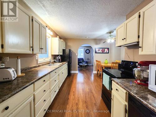 123 Picadilly Circle, Iroquois Falls, ON - Indoor Photo Showing Kitchen With Double Sink