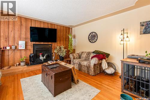836 Keith Street, Moose Jaw, SK - Indoor Photo Showing Living Room With Fireplace