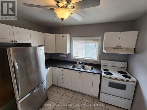 16 Sixteenth Street, Toronto, ON - Indoor Photo Showing Kitchen With Double Sink