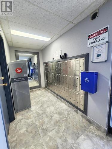 Mailboxes at Entrance - 409 - 845 Kyle Court, Brockville, ON - Indoor Photo Showing Basement