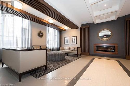 1011 - 150 Main Street E, Hamilton, ON - Indoor With Fireplace