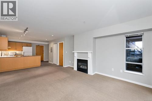 311 90 Regatta Landing, Victoria, BC - Indoor With Fireplace
