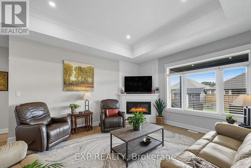 19 Statham Street, Strathroy-Caradoc (Se), ON - Indoor Photo Showing Living Room With Fireplace