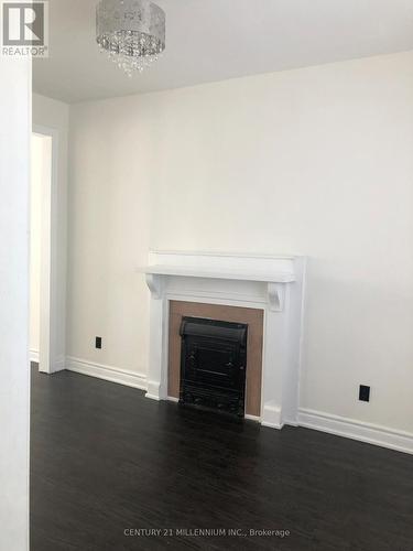 71 Clouston Avenue, Toronto, ON - Indoor Photo Showing Living Room With Fireplace