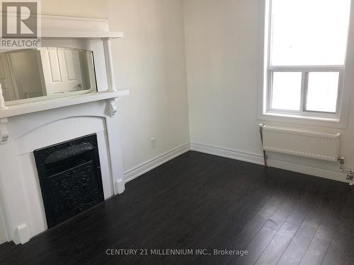 71 Clouston Avenue, Toronto, ON - Indoor Photo Showing Other Room With Fireplace