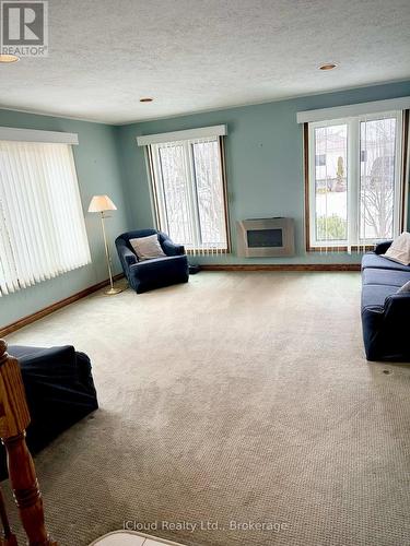 86 Glendale Drive E, Tillsonburg, ON - Indoor Photo Showing Living Room With Fireplace