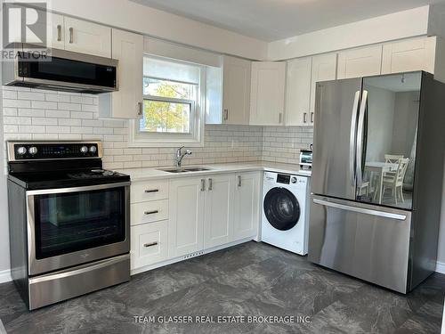 630 Victoria Street, London East (East C), ON - Indoor Photo Showing Kitchen With Double Sink