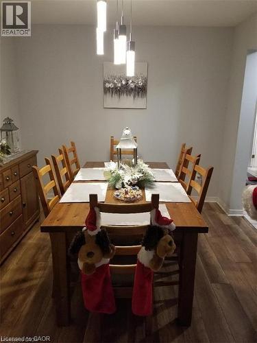 Dining room with dark wood finished floors - 185 Sulmona Drive, Hamilton, ON - Indoor Photo Showing Dining Room