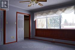 Primary His and Her Closets - 