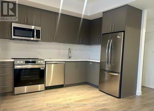517 - 30 Markdale Lane, Markham, ON - Indoor Photo Showing Kitchen