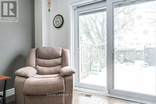 Newer Patio Door with built in blinds - 13 Arden Park, Stratford, ON - Indoor Photo Showing Other Room