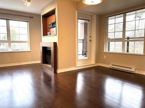 205 2940 King George Boulevard, Surrey, BC - Indoor Photo Showing Other Room With Fireplace