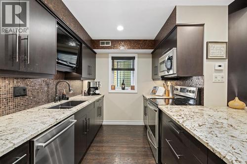 1500 Venetian Boulevard Unit# W-9, Point Edward, ON - Indoor Photo Showing Kitchen With Double Sink With Upgraded Kitchen