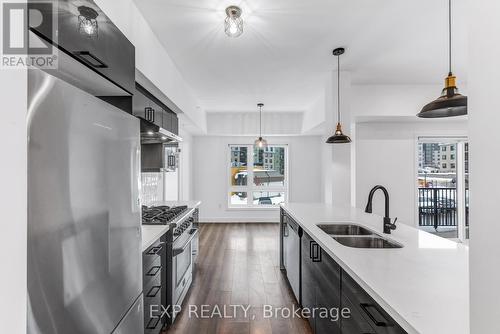 101 - 4 Spice Way, Barrie, ON - Indoor Photo Showing Kitchen With Double Sink With Upgraded Kitchen