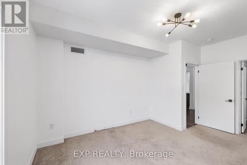 101 - 4 Spice Way, Barrie, ON - Indoor Photo Showing Other Room