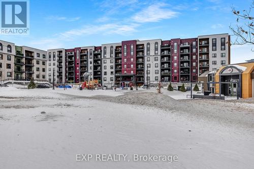 101 - 4 Spice Way, Barrie, ON - Outdoor With Balcony With Facade