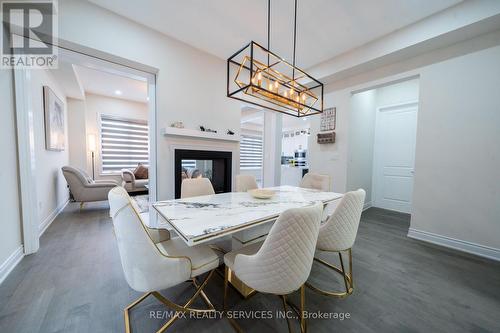 3444 Mosley Gate, Oakville, ON - Indoor Photo Showing Dining Room With Fireplace