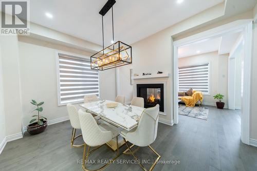3444 Mosley Gate, Oakville, ON - Indoor Photo Showing Dining Room With Fireplace