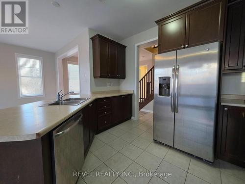 1127 Savoline Boulevard, Milton, ON - Indoor Photo Showing Kitchen With Double Sink