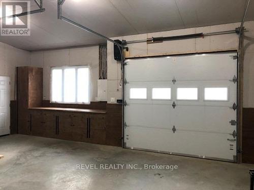 25'x25'+2'x10' garage with 11' cathedral ceiling. - 540 Mahoney Road, Timmins (Mtj - Mountjoy Rural), ON - Indoor Photo Showing Garage