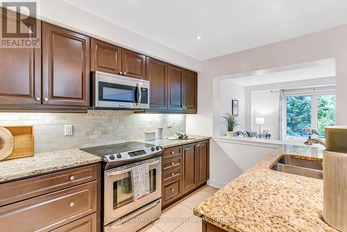 #37 - 1035 Victoria Road S, Guelph (Kortright East), ON - Indoor Photo Showing Kitchen With Stainless Steel Kitchen With Double Sink With Upgraded Kitchen