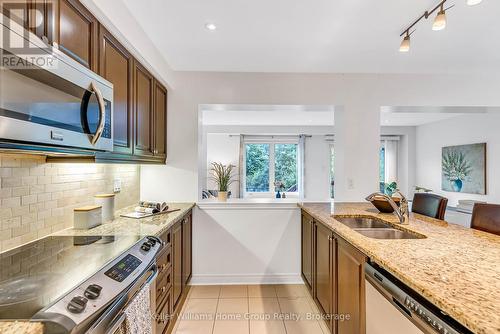 #37 - 1035 Victoria Road S, Guelph (Kortright East), ON - Indoor Photo Showing Kitchen With Double Sink With Upgraded Kitchen