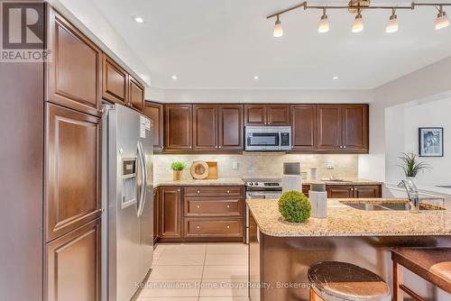 #37 - 1035 Victoria Road S, Guelph (Kortright East), ON - Indoor Photo Showing Kitchen With Double Sink