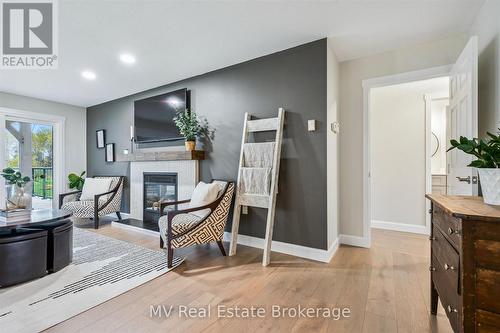 7003 Beatty Line N, Centre Wellington, ON - Indoor With Fireplace