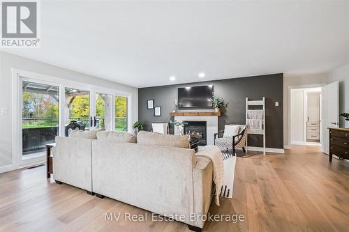 7003 Beatty Line N, Centre Wellington, ON - Indoor Photo Showing Living Room With Fireplace