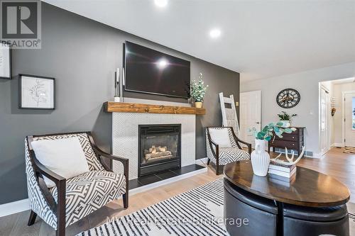 7003 Beatty Line N, Centre Wellington, ON - Indoor Photo Showing Living Room With Fireplace