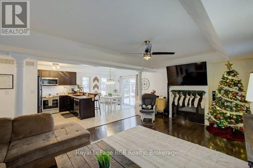 11 Green Street, Mapleton, ON - Indoor Photo Showing Living Room With Fireplace