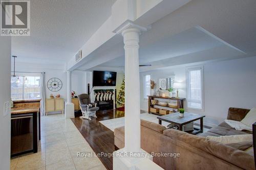 11 Green Street, Mapleton, ON - Indoor Photo Showing Living Room With Fireplace