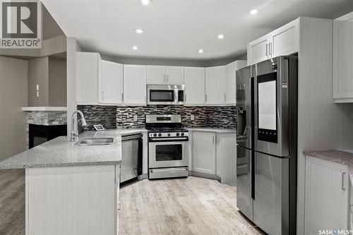 5006 Wascana Vista Court, Regina, SK - Indoor Photo Showing Kitchen With Stainless Steel Kitchen With Upgraded Kitchen