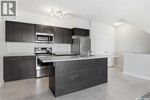 307A 3355 Green Poppy Street, Regina, SK - Indoor Photo Showing Kitchen