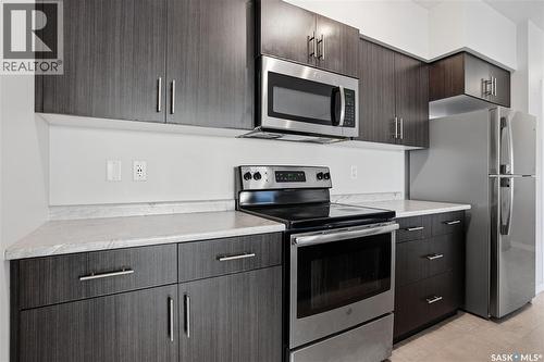 307A 3355 Green Poppy Street, Regina, SK - Indoor Photo Showing Kitchen