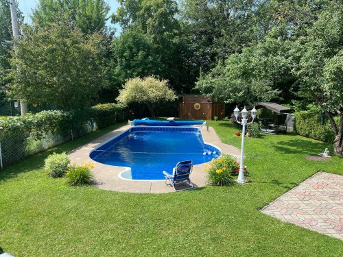 Pool - 621 Boul. Robitaille, Notre-Dame-Du-Mont-Carmel, QC - Outdoor With In Ground Pool With Backyard
