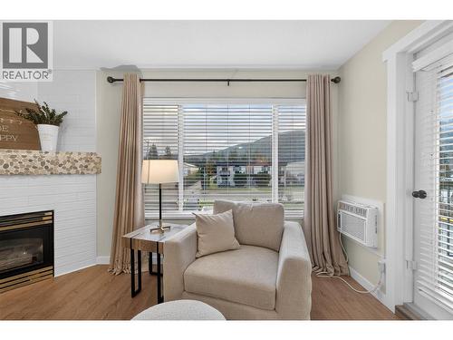 1002 Riverside Avenue Unit# 206, Sicamous, BC - Indoor Photo Showing Living Room With Fireplace