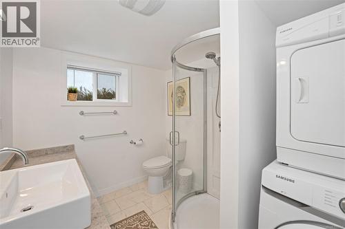 Basement suite bathroom - 2229 Arbutus Rd, Saanich, BC - Indoor Photo Showing Laundry Room
