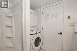 Basement suite bathroom w/ laundry - 