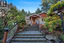 Cape Cod facade with mature gardens include flowering Magnolia tree - 2229 Arbutus Rd, Saanich, BC  - Outdoor With Deck Patio Veranda 