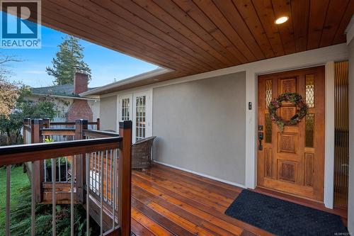 Wood deck and entrance to primary residence - 2229 Arbutus Rd, Saanich, BC - Outdoor With Deck Patio Veranda With Exterior