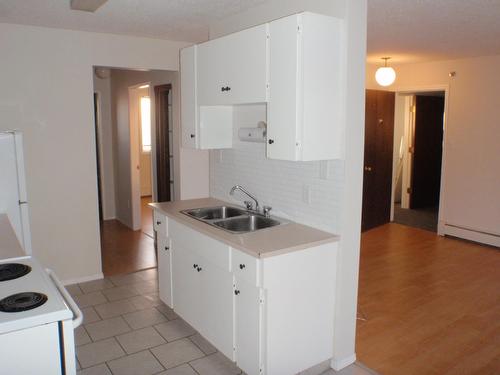 5135  52 Avenue, Barrhead, AB - Indoor Photo Showing Kitchen With Double Sink