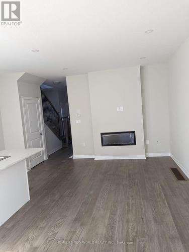 18 - 30 Mia Drive, Hamilton, ON - Indoor With Fireplace