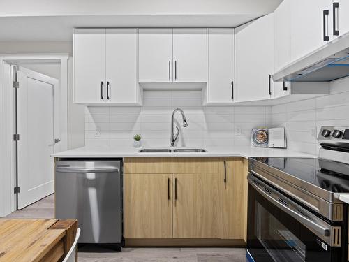 12007  106 Street, Edmonton, AB - Indoor Photo Showing Kitchen With Double Sink