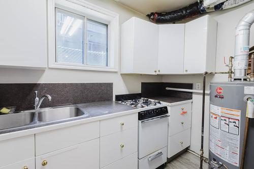 8504  98 Street, Edmonton, AB - Indoor Photo Showing Kitchen With Double Sink